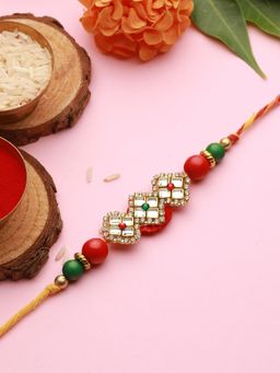 Saraf RS Jewellery - Red Kundan Studded Luxe Rakhi with Roli Chawal