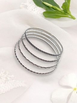 XAGO - Le Anuja Set Of 4 Silver Plated Oxidized Bangles