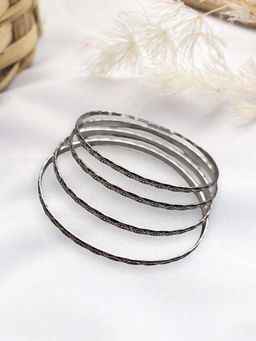 XAGO - Le Athulya Set Of 4 Silver Plated Oxidized Bangles