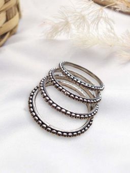 XAGO - Le Anoma Set Of 4 Silver Plated Oxidized Bangles