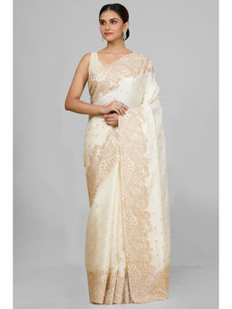 Aparnaa - Graceful White Tussar Silk Golden Embroidered Saree and Unstitched Blouse