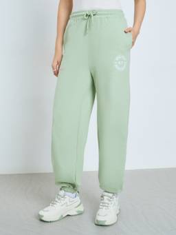 Styli - Women Green Print Cotton Drawstring Waist Tapered Fit Joggers