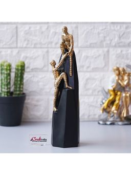 eCraftIndia - Golden Polyresin 2 Boys Climbing on rock Human Figurines Decorative Showpiece