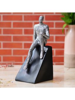 eCraftIndia - Silver Man Statue Sitting on Triangle Black Base Human Figurine Decorative Showpiece