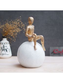 eCraftIndia - Golden Boy Statue Sitting on White Ball Human Figurine Decorative Showpiece