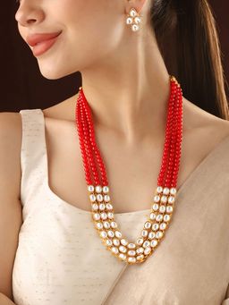 Priyaasi - A Kundan Jewellery Set Adorned with Red Rubies and Exquisite Earrings