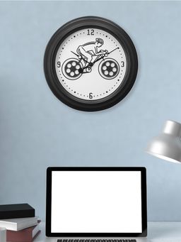 At Home by Nilkamal - Cycling Man Wall Clock -Black & White
