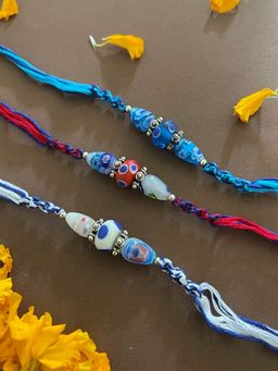 Digital Dress Room - Designer Rakhi WhiteBlueRed Beads Thread Rakhi (Pack of 3)