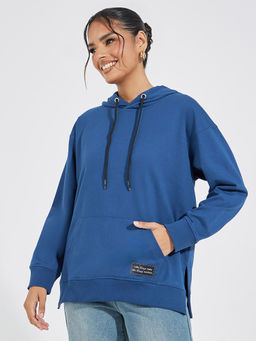 Styli - Women Blue Oversized Fit Long Line with Side Slit Hoodie with Badge