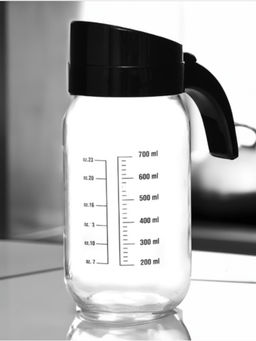 At Home by Nilkamal - Transparent 1000ml Glass Oil Measure Jar with Lid Transparent