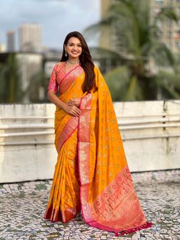 ELITE WEAVES - Mustard Soft Silk Zari Woven Ikkat Patola Saree With Unstitched Blouse