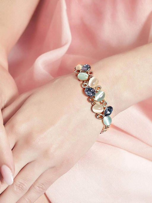 Yellow Chimes Women Gold-Toned & Blue Stone Studded Bracelet