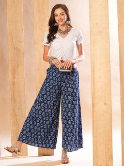 Globus - Women Indigo Allover Ethnic Printed Elasticated Waistband Flared Panelled Palazzos