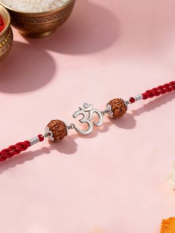 Ornate Jewels - 925 Silver Rhodium Plated OM Rudraksha Thread Rakhi With Roli Chawal