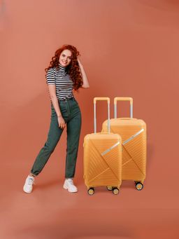 The Clownfish - Combo Of 2 Polypropylene Hard Case 8 Wheel Trolley Bags - Orange (M/S)