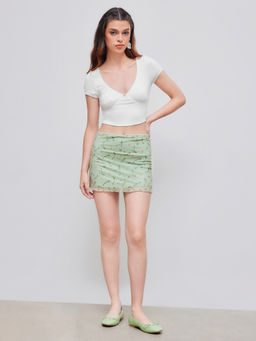 Cider - V-Neck Solid Bowknot Crop Top & Mesh High Rise Floral Lettuce Trim Mini Skirt Set