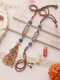 Aatmana - Evil Eye & Floral Motif Bhaiya Bhabhi Rakhi with Lamba & Roli Chawal