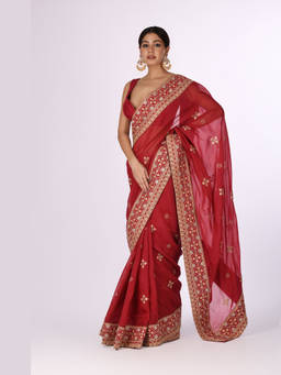 Isha and Anshul - Maroon Organza Golden Embroidery and Broad Border Saree