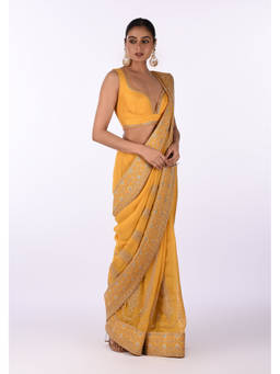 Isha and Anshul - Mustard Yellow Georgette Silver Embroidered Borders Saree