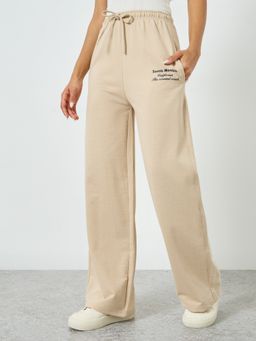 Styli - Men Beige Solid Mid-Rise Wide Leg Drawstring Trackpant
