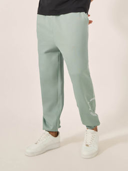 Styli - Men Green Oversized Joggers with Placement Print