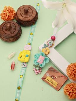 Saraf RS Jewellery - Cute Handcrafted Ribbon Purse Flower Toy Rakhi & Lumba with Roli Chawal