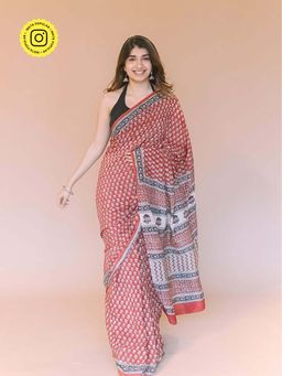 The Indian Ethnic Co. - Maroon Butti Bagru Hand Block Print Modal Saree with Unstitched Blouse.