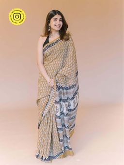 The Indian Ethnic Co. - Mustard Butti Bagru Hand Block Print Modal Saree with Unstitched Blouse.