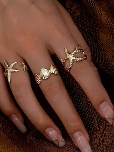 Women Gold Tone Ocean Theme- Star Fish and Shell Shape Rings (Pack of 3)