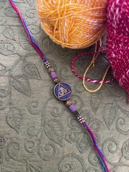 Digital Dress Room - Fancy Rakhi Designs Tribal Om Pattern Gold Plated Beads Mauli Threads Rakshasutra