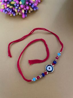 Digital Dress Room - Gold Plated Dark Blue Evil Eye Rakhi