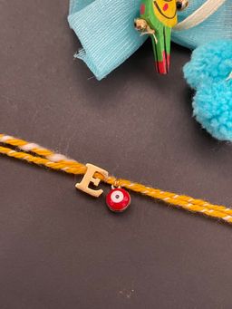 Digital Dress Room - Letter "E" Initial & Red Evil Eye Rakhi