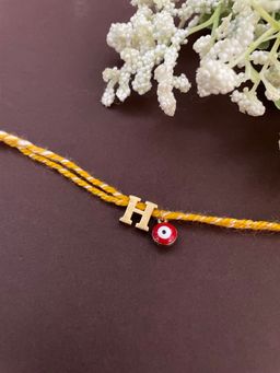 Digital Dress Room - Letter "H" Initial & Red Evil Eye Rakhi