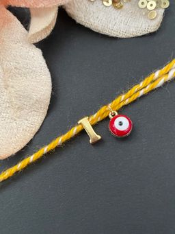 Digital Dress Room - Letter "I" Initial & Red Evil Eye Rakhi