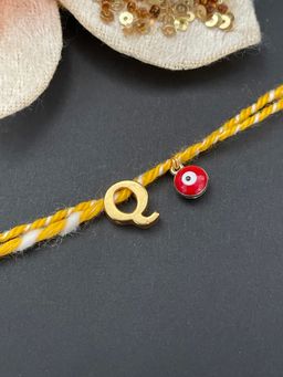 Digital Dress Room - Letter "Q" Initial & Red Evil Eye Rakhi