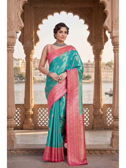 Monjolika Fashion - Women Turquoise Tissue Woven Saree with Blouse