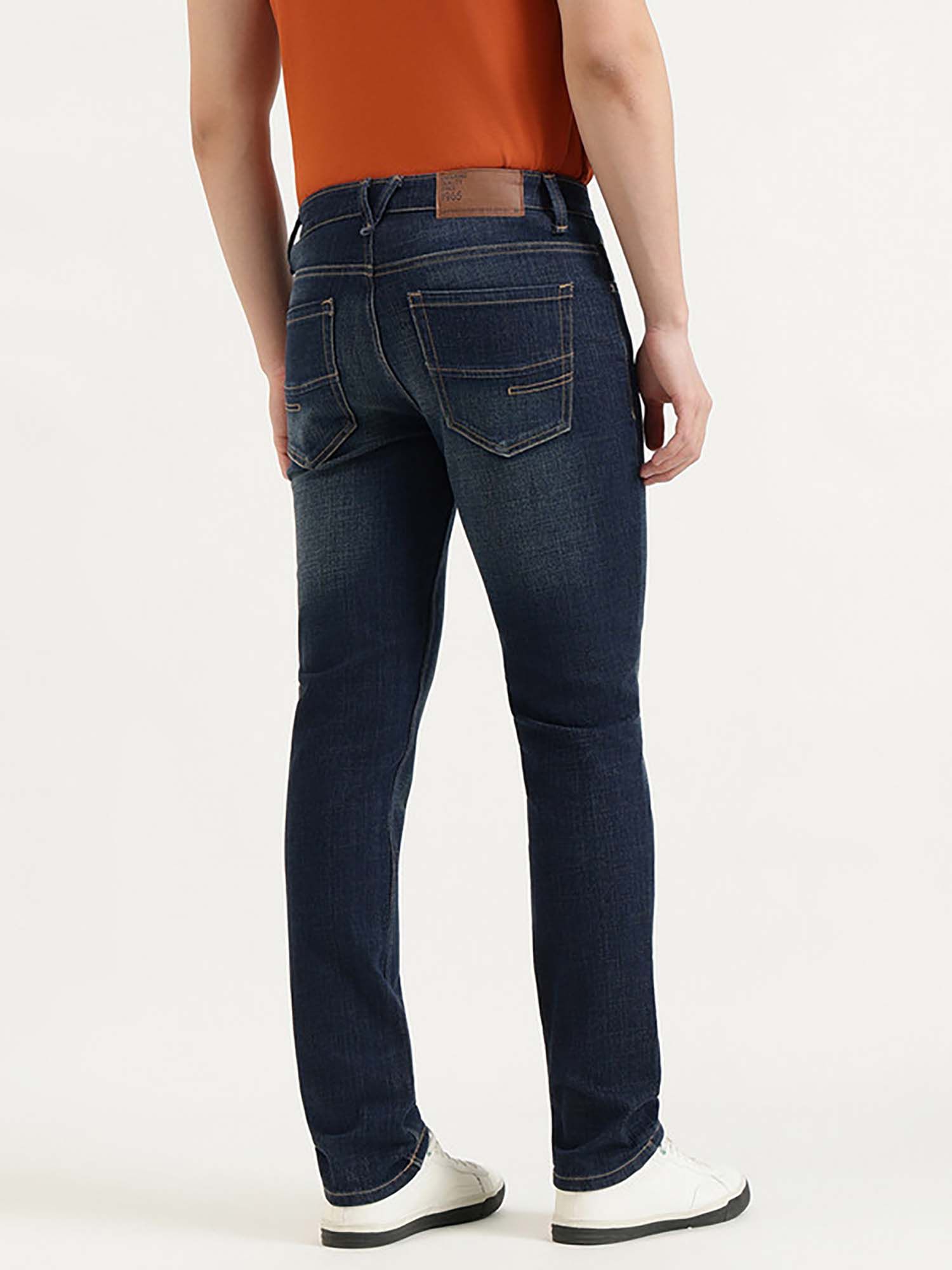 Men Blue Cotton Blend Solid Jeans
