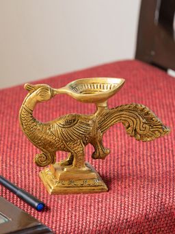 ExclusiveLane - Gleaming Peacock Hand-Etched Carved Diya In Brass (730 Grams)