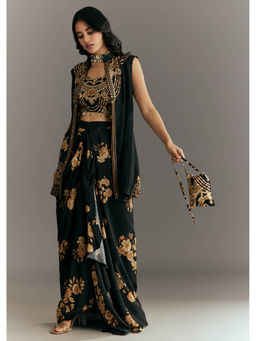 KALKI FASHION - Black Muslin Crop Top With Floral Printed Skirt, Pouch & Jacket