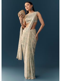 KALKI FASHION - Women Cream Satin Floral Sequined Work Saree with Unstitched Blouse
