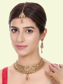 Anika's Creations - Designer Gold Plated Traditional Matte Finish Necklace with Earrings & Maang Tikka