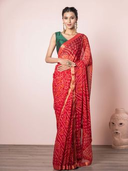 EXCLUSIVA - Red Blended Chiffon Bandhani Print Saree with Unstitched Blouse