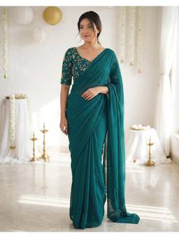 Nyri - Teal Green Georgette Saree