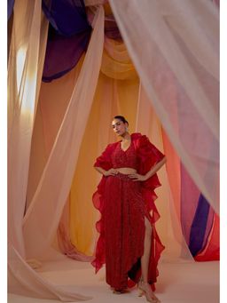 SHIAN - Ruby Red Fully Embroidered Halter Blouse With Drape Skirt And Ruffle Organza Cape
