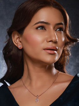 Saraf RS Jewellery - Rose Gold Plated Zircon Studded Minimal Floral Locket Jewellery Set