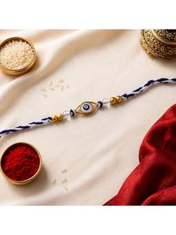 ISHKAARA - Elegant Golden Evil Eye Beaded Thread Rakhi