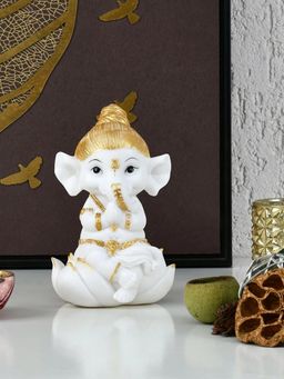 At Home by Nilkamal - Ganesha On Lotus Decorative Polyresin Showpiece (White & Gold)