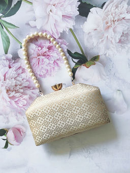 A Clutch Story - Kathak Ivory Clutch