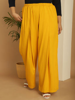 theRebelinme - Plus Size Women's Mustard Solid Color Flared Palazzos