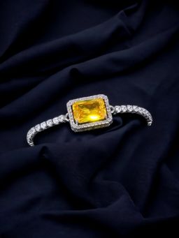 Jewels Galaxy - Silver Plated Rectangular Yellow Crystal Studded Matrix Tennis Bracelet